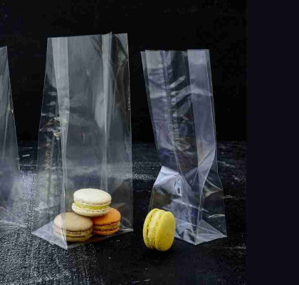 Cellofanpåse nr 0, kanister i PP med kuvertbotten Cellofanpåse nr 0 en kanister med kuvertbotten med macrons