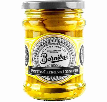 Glasburk med gula, inlagda citroner. Etikett med texten 