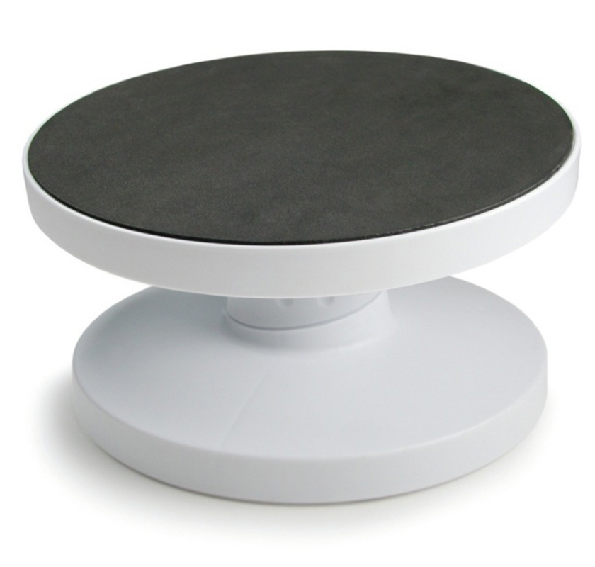 Roterbart och tiltbart dekorationsfat fr�b Tala