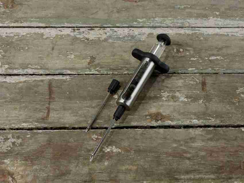 Injektor f�r marinering svart och silverf�rgad