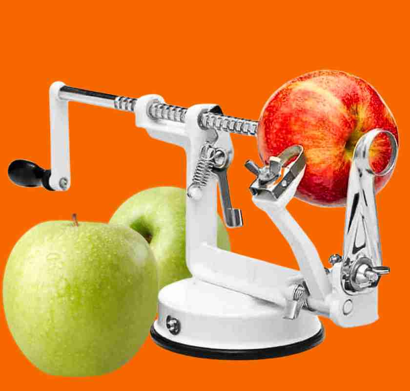 Vit �ppelskalare Moster Hulda med gr�na och r�da �pplen mot orange