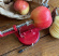 Röd äppelskalare från Moster Hulda, äpplen och påsar