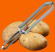 Potatisskalare klassisk i rostfritt stl med potatis motorange