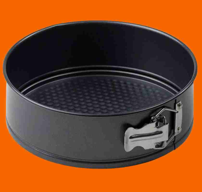 Springform 24 cm mot orange bakgrund