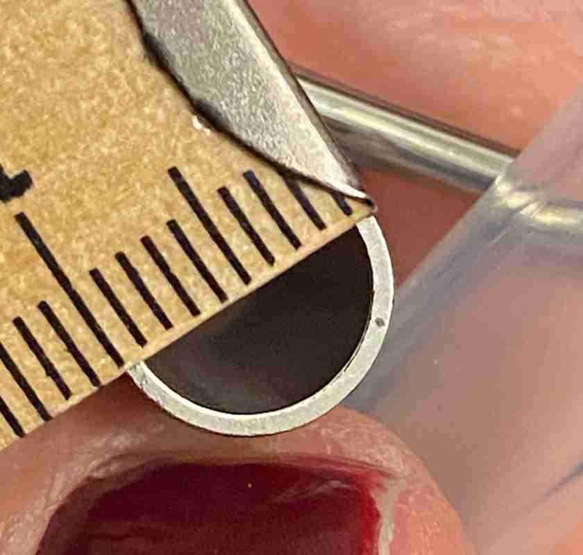 Extra slang och kl�mma till saftkokare tumstock m�ter diameter p�  tappen