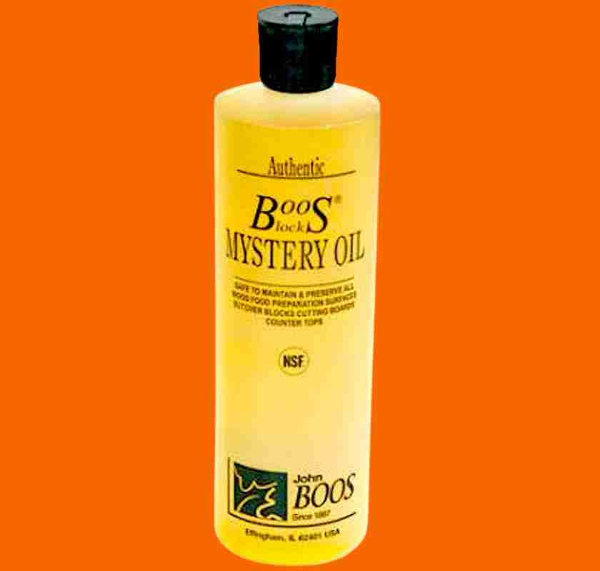 Olja f�r sk�rbr�dan Boos Block Mystery Oil mot orange bakgrund