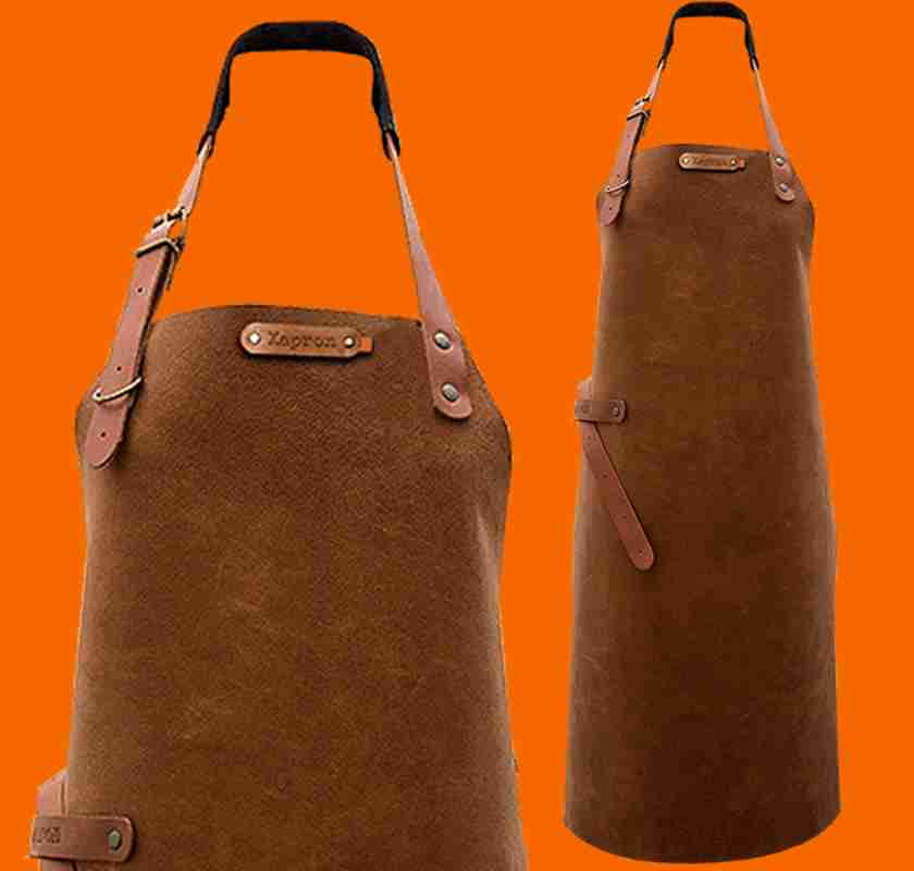 Skinnf�rkl�de handgjort rostbrunt Utah mot orange bakgrund