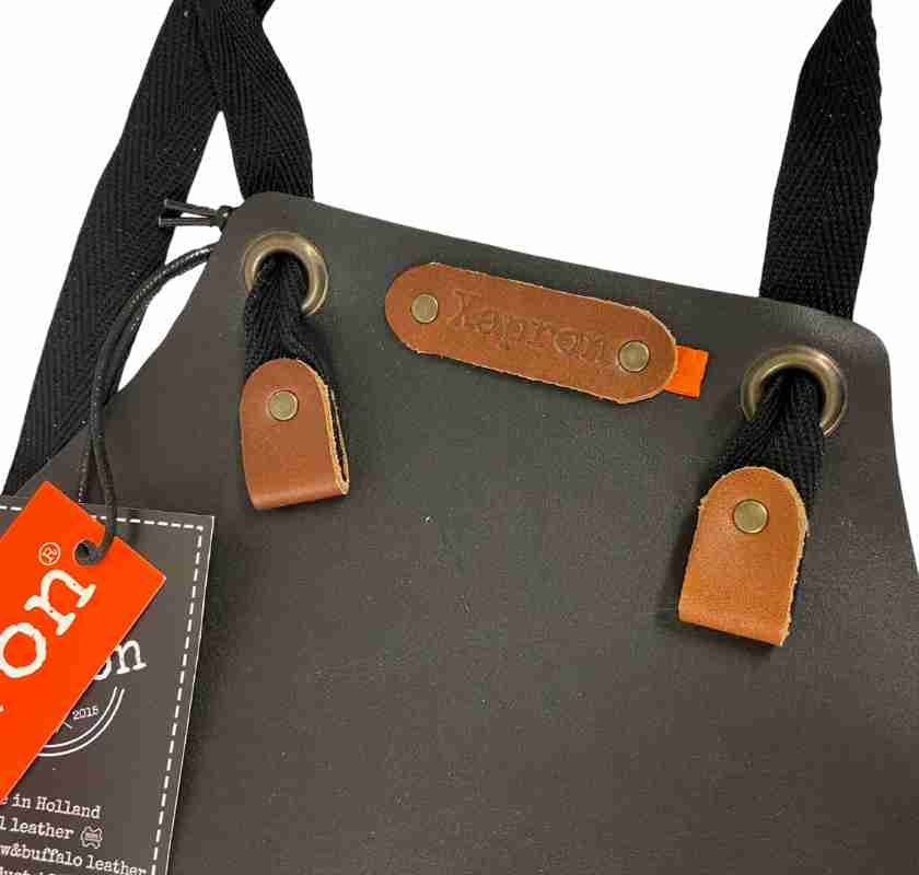 Detalj av Barnf�rkl�de i skinn svart