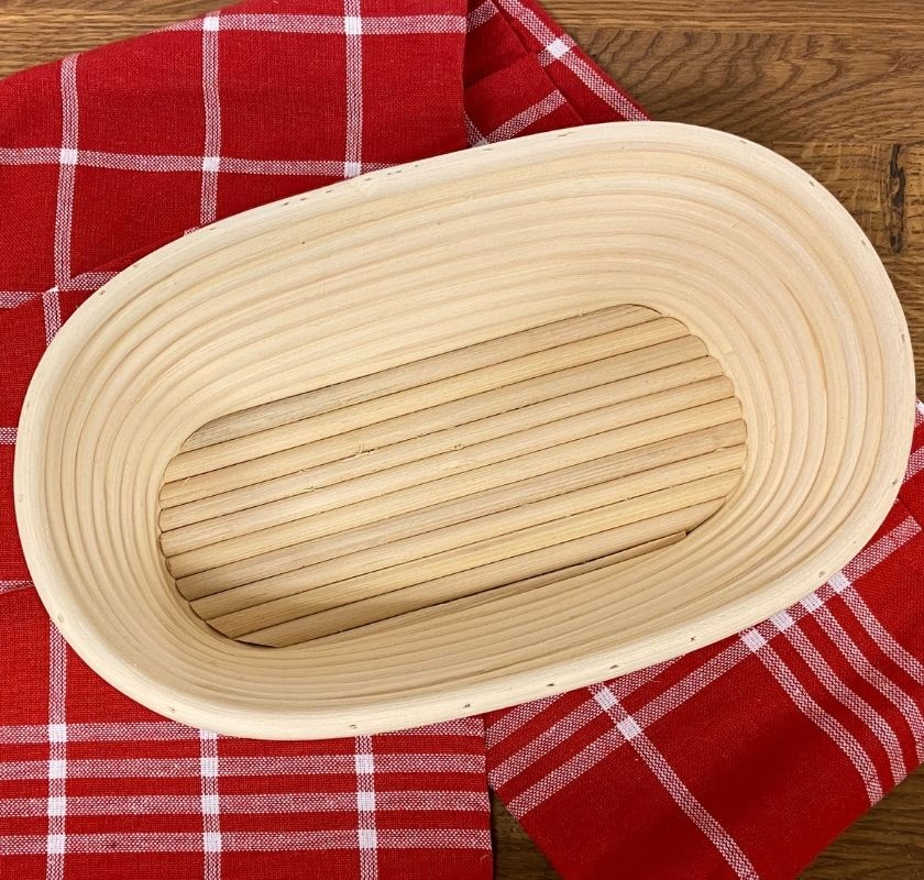  J�skorg oval p� r�drutig k�kshandduk