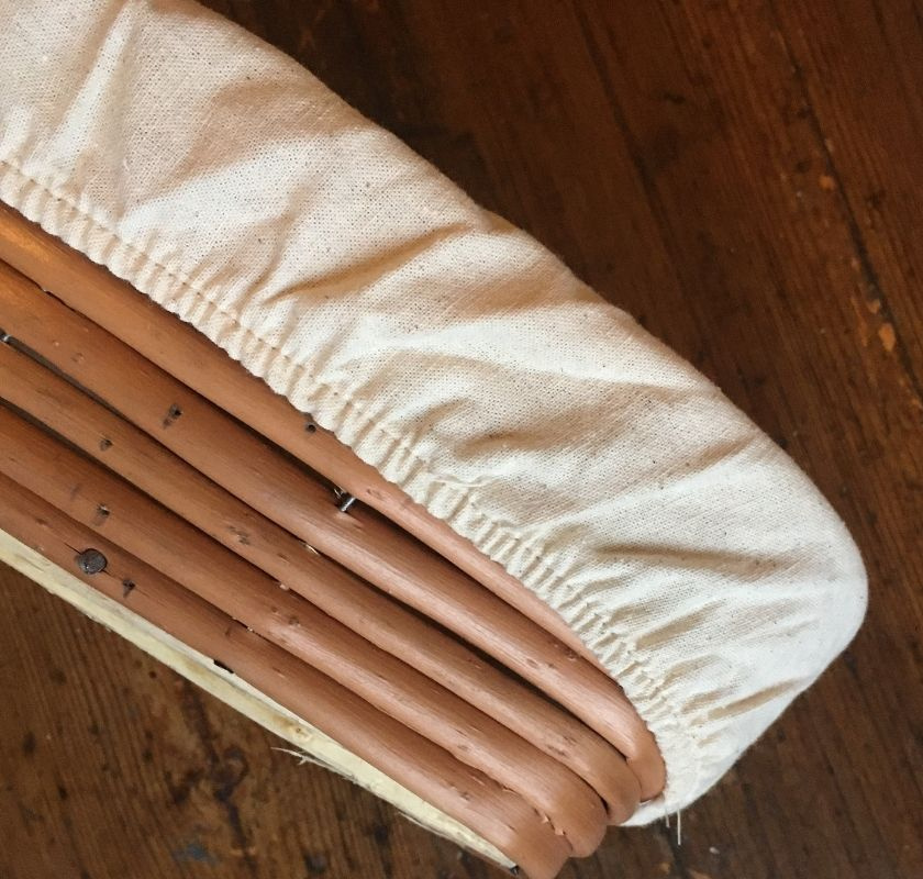 Oval j�skorg i PIL med �verdrag i textil