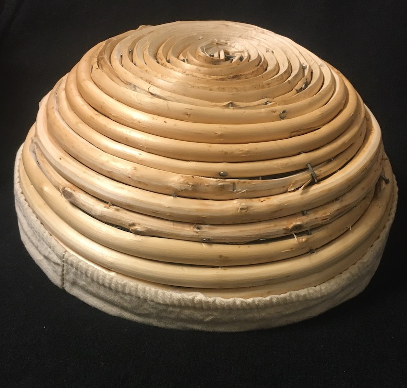 Rund j�skorg i PIL med �verdrag i textil