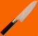 Santokukniv KAI Wasabi black 16,5 cm Santokukniv KAI Wasabi black 16,5 cm mot orange