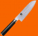 Santokukniv liten KAI Shun Classic 14cm Santokukniv liten KAI Shun Classic 14cm mot orange