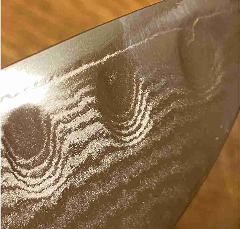 Detalj av knivblad p� Santokukniv KAI Shun Classic 18 cm olivslipad