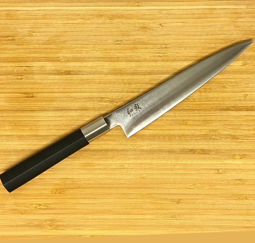 Fil�kniv flexibel KAI Wasabi black 18 cm p� sk�rbr�da