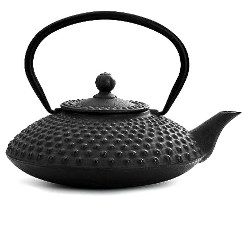 Svart tekanna i gjutj�rn