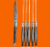 6 st grillknivar Laguiole med svarta handtag mot orange 