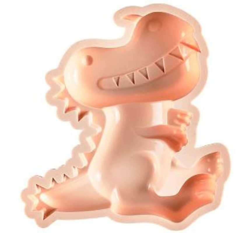 Kakform med breda sv�ngda r�fflor och en kaka p� galler