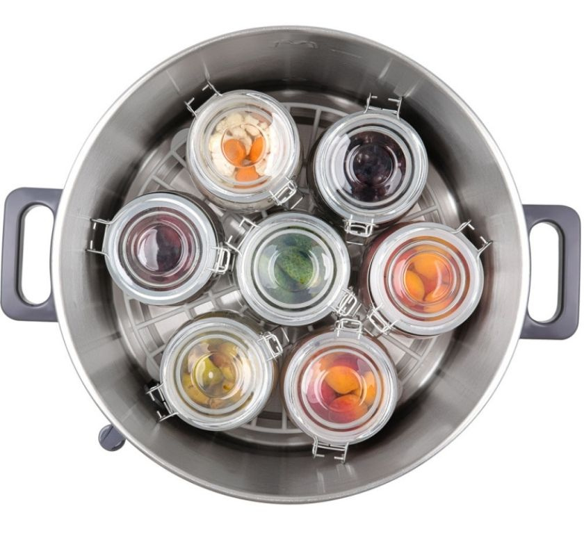 Konserveringsmaskin ovanifr�n med burkar