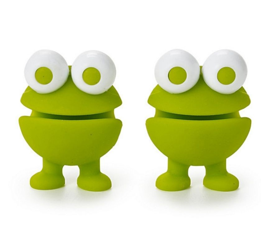 Gr�na silikongubbar som h�ller upp grytlock