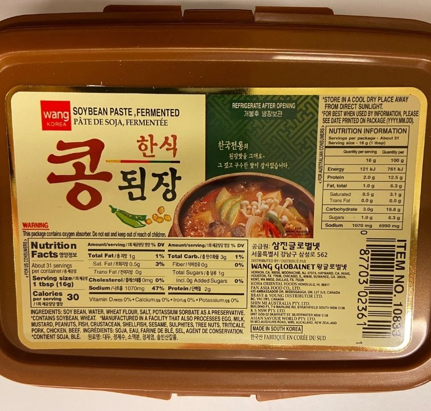 Etikett med beskrivning p� locket av asken