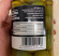 Glasburk med gröna oliver