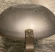 Wokpanna i kolstål, detalj av botten, woken har ett skyddande bivaxlager 