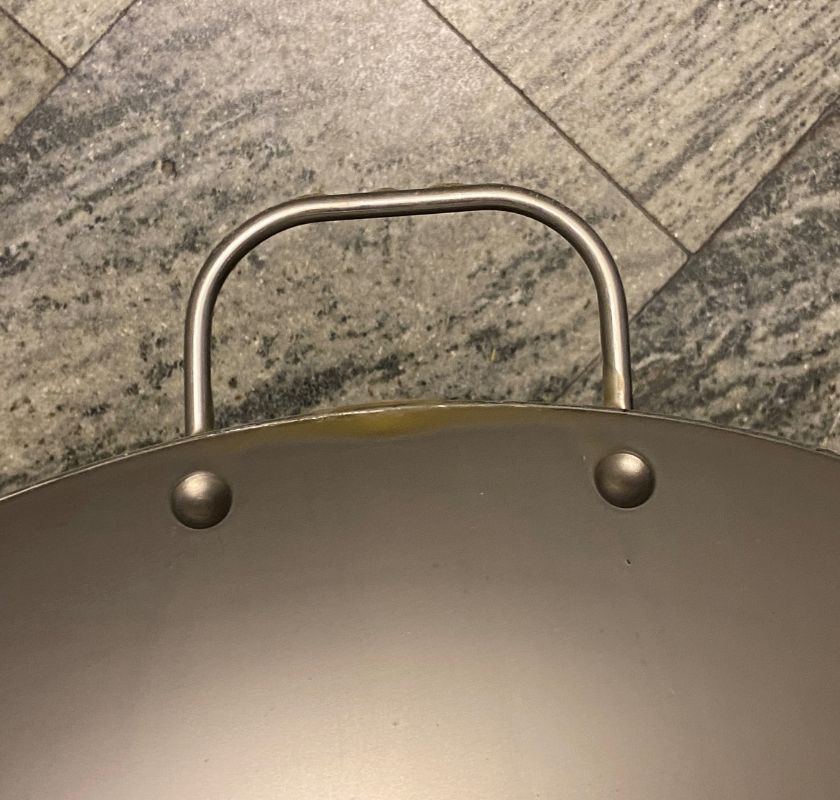 Handtag detalj. Obs vax lagret syns som en gulaktig skugga