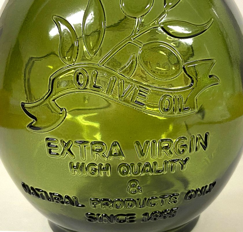 gr�n olivoljeflaska baksidan