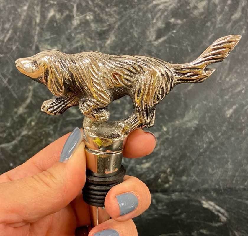 Flaskstopp hund i hand