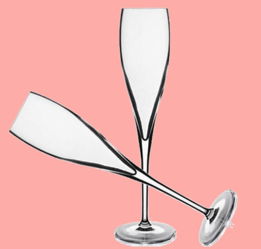 2 champagneglas mot korallr�d bakgrund