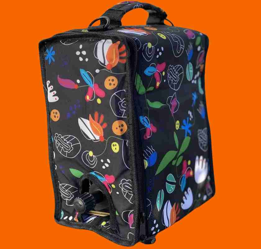 Kylv�ska f�r boxvin m�nstrad multicolour mot svart frilagd bild mot orange bakgrund