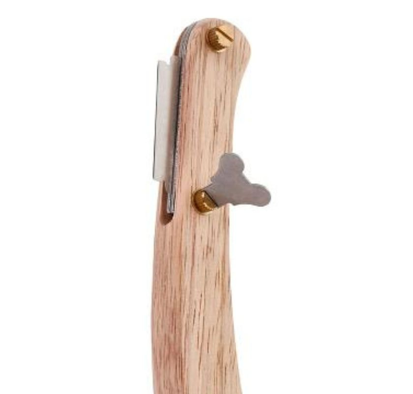 Snittkniv med rakblad och handtag i tr�