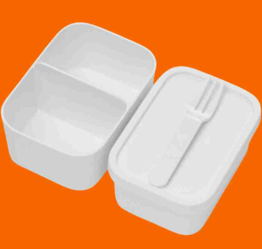 Bento-box extra innerl�dor vita mot orange bakgrund