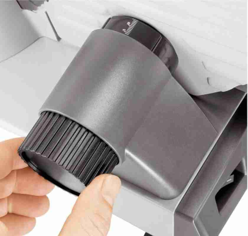 St�ll in skivornas tjocklek p� sk�rmaskin i rostfritt st�l