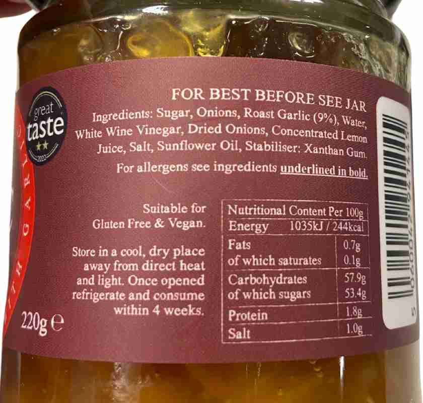 Roast Garlic Jam, Rostad vitl�ksmarmelad med chili i glasburk detalj av etikett p� burken