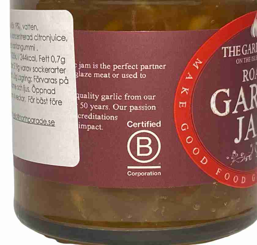 Roast Garlic Jam, Rostad vitl�ksmarmelad med chili i glasburk detalj av etikett p� burken