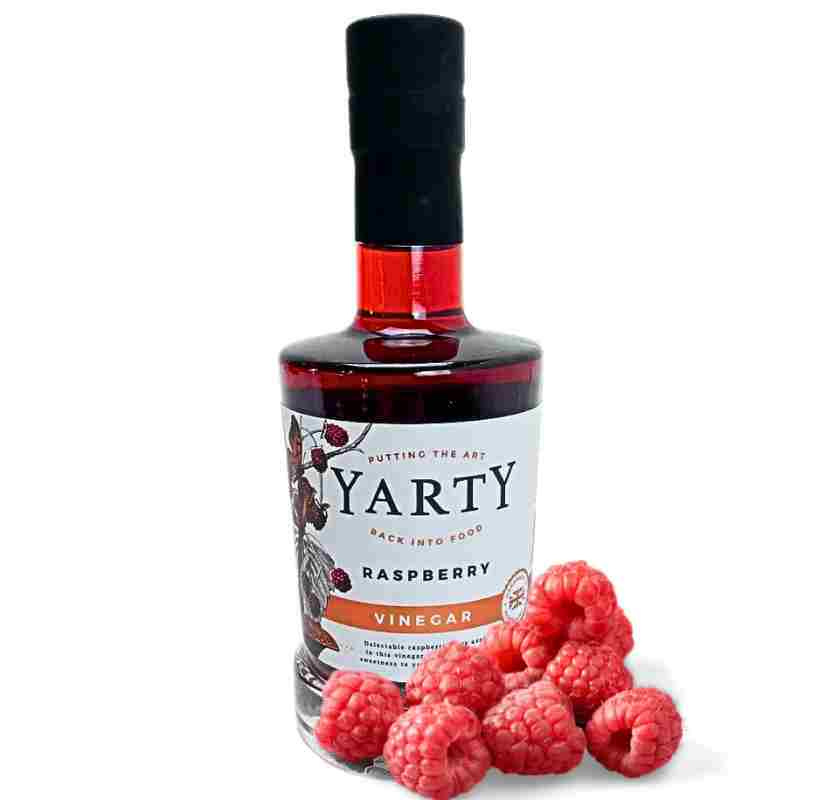 Glasflaska med Hallonvin�ger Yarty rasperry vinegar och hallon