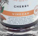 Körsbärsvinäger Yarty cherry vinegar Detalj av flaska med Körsbärsvinäger Yarty cherry vinegar
