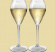 2 champagneglas i plast Champagneglas i plast 2-pa ck mot beige bakgrund