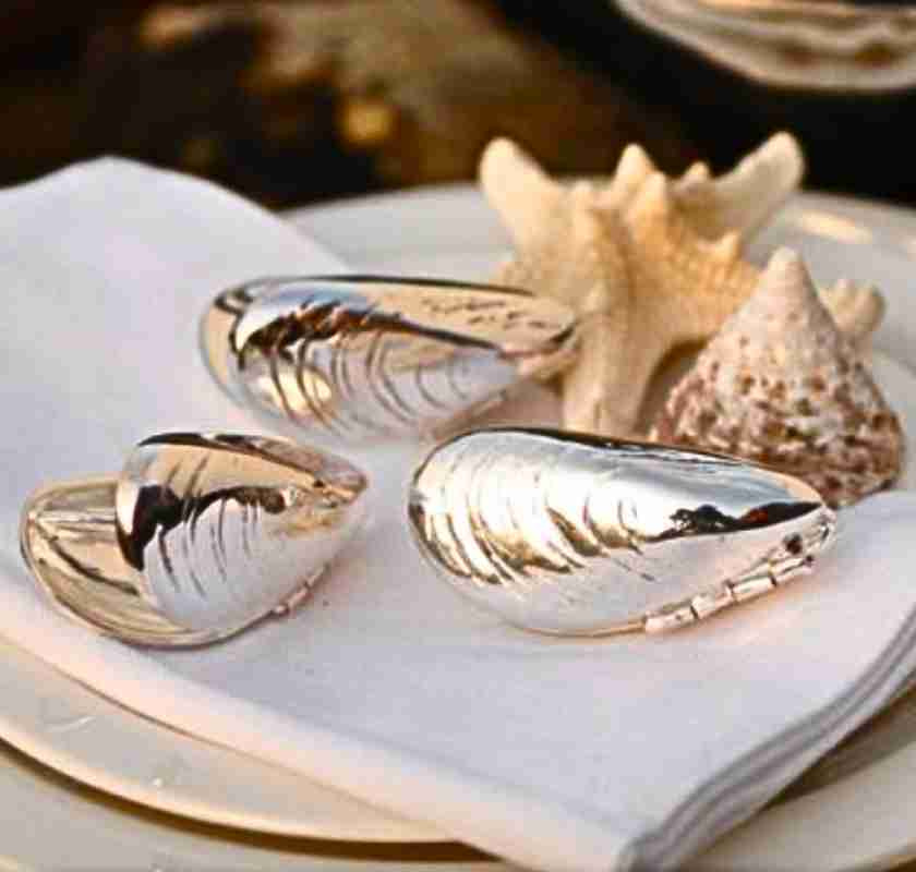 Musselbestick 3 silver-muss lot p� servett