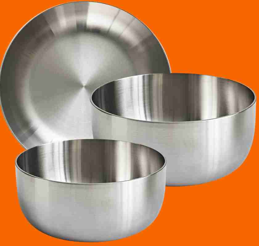 3 gastro-sk�lar i rostfritt st�l i olika storlekar fr�n Mathias Dahlgren Culimat emot orangge bakgrund