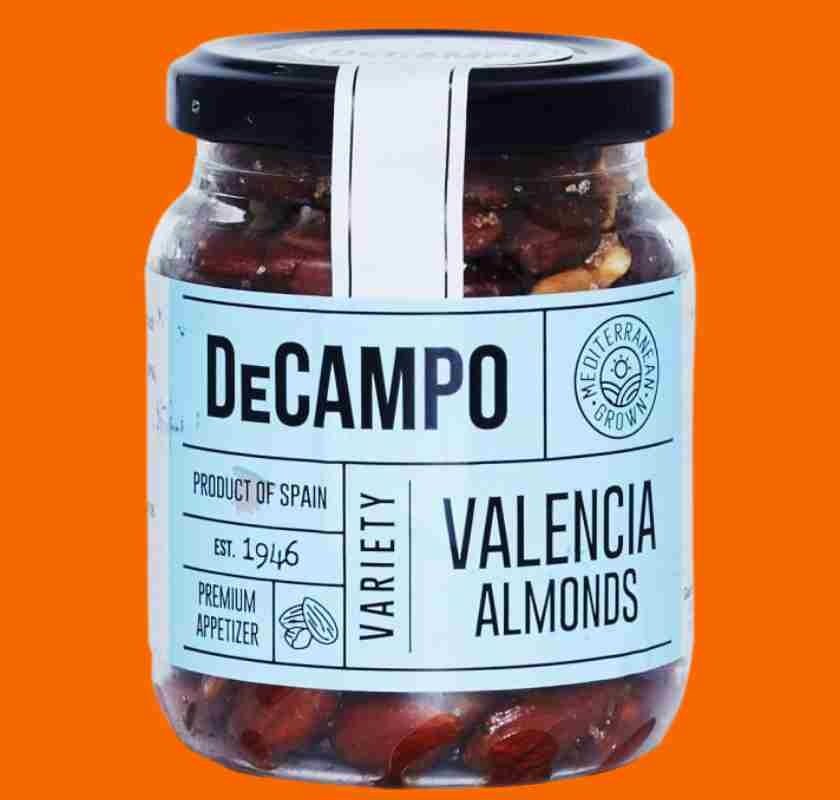 DeCampo Valenciamandel saltad med skal i burk mot orange bakgrund