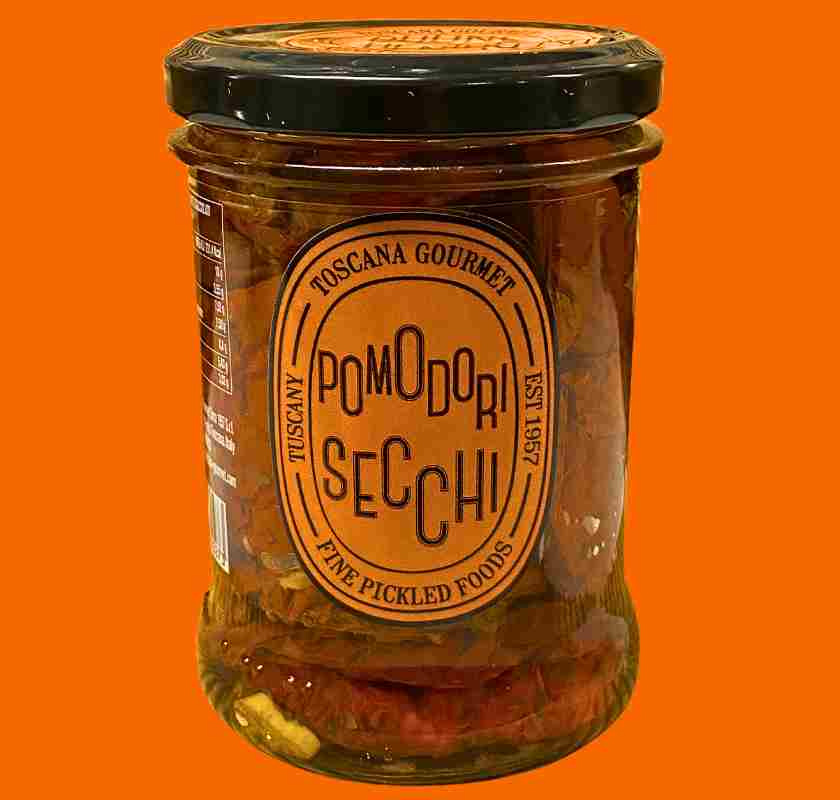 Soltorkade tomater Toscana Gourmet mot orange bakgrund