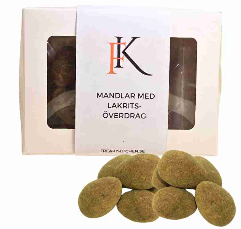 Mandlar med lakrits�verdrag i vit ask med f�nster, mandlar framf�r asken