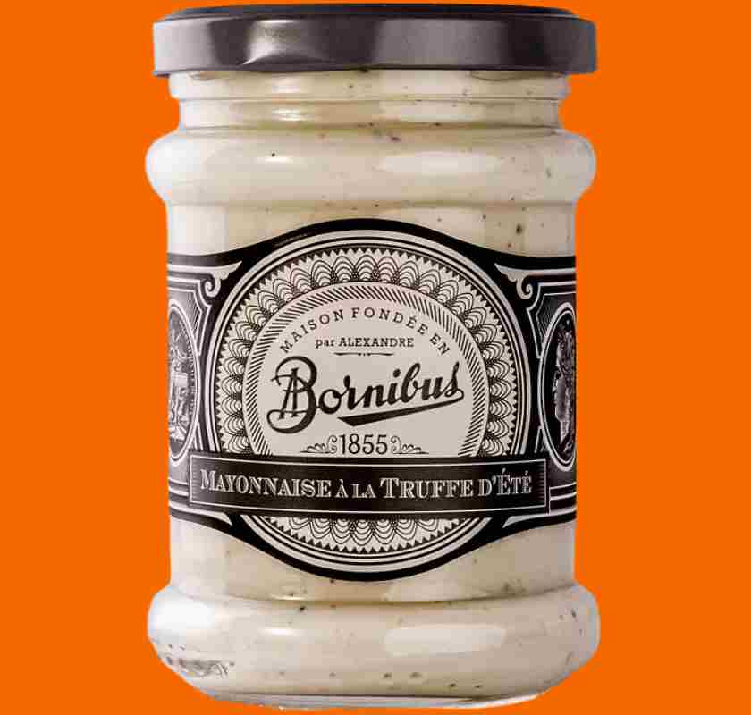 Tryffelmajon�s Maison Bornibus Mayonnaise � la truffe d''�t� i glasburk mot orange bakgrund