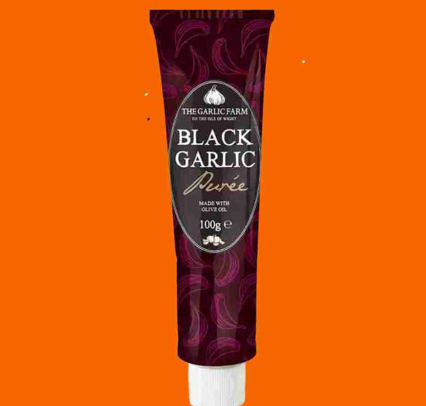 Black Garlic pur� i tub mot orange