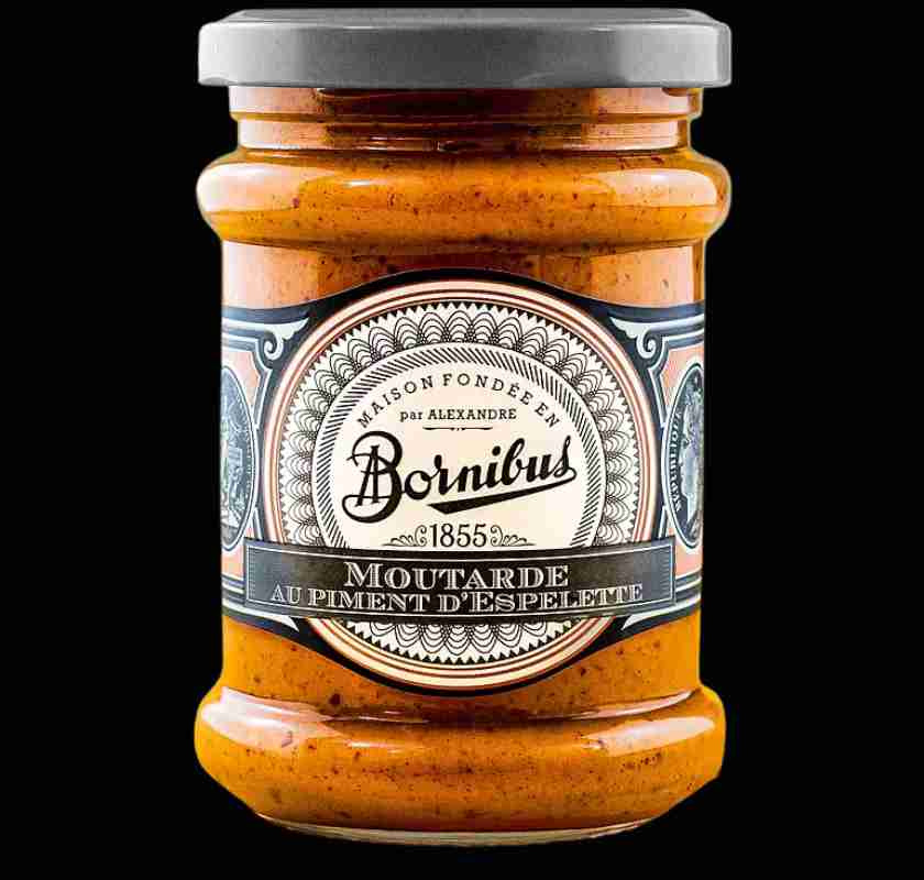 Espelettesenap fr�n Bornibus i glasburk mot svart bakgrund