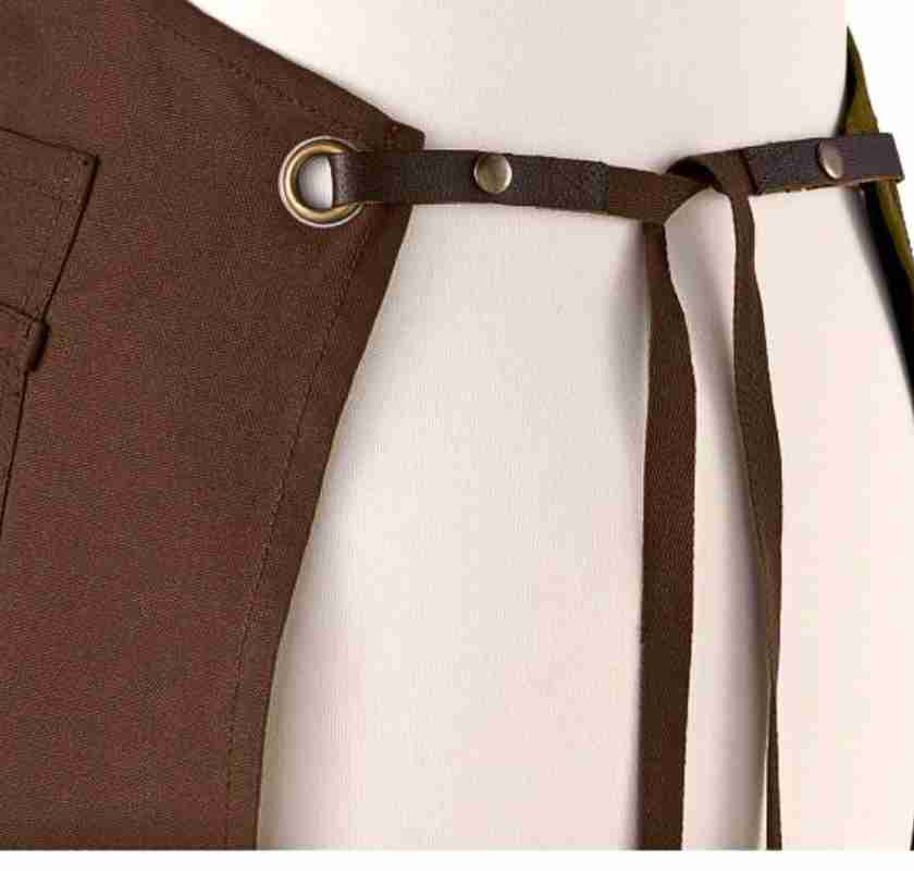 F�rkl�de i canvas med tre fickor kaffe-f�rgat brunt detalj