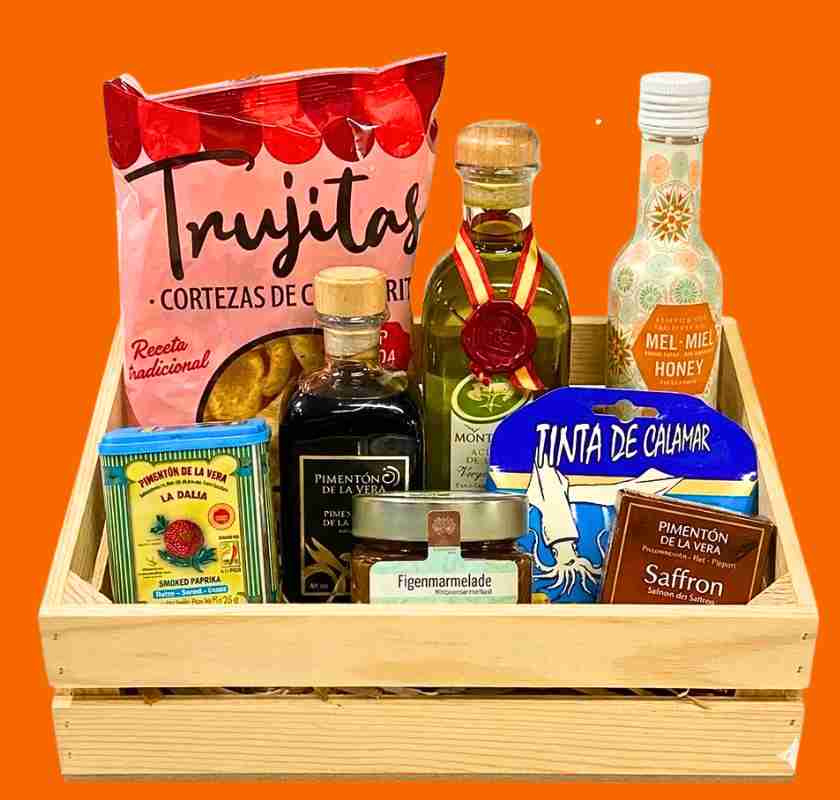 Spansk presentkorg, stora spanska delikatessl�dan i tr�l�da mot orange bakgrund